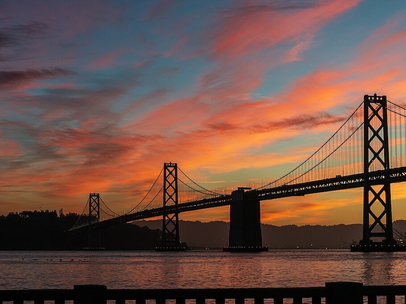 Photo of sunrise at Bay Bridge by the Embarcadero.